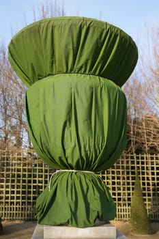 Statues and sculptures are wrapped in a blanket for protection during the cold autumn-winter season.