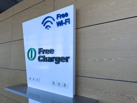 Tech-friendly corner with free Wi Fi and charging options, supporting digital connectivity and convenience for users in high traffic environments like terminals or cafes
