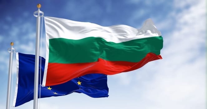 The flags of Bulgaria and the European Union waving in the wind on a clear day. Bulgaria became a member of the EU in January 2007. 3d illustration render. Fluttering textile