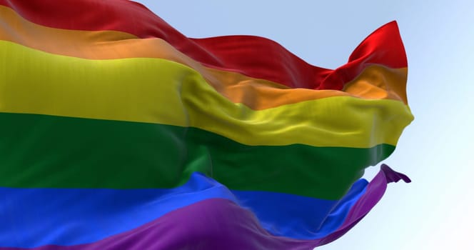 Rainbow flag waving on a clear day. Multicolored flag with stripes in the colors of the rainbow, often used as a symbol of LGBT pride. 3d illustration render. Fluttering fabric