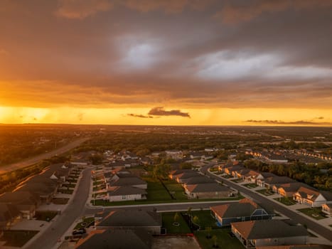 Aerial view of a dramatic sunset lighting clouds before severe thunderstorm near Georgetown Texas