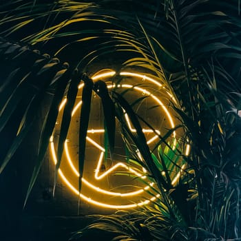 Neon peace sign glowing through tropical palm leaves, creating an ambient background, 