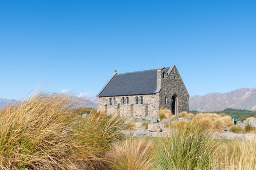 Historic small stone Church of Good Sheppard a popular tourist location at Tekapo South Island New Zealand