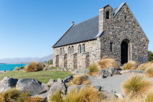 Historic small stone Church of Good Sheppard a popular tourist location at Tekapo South Island New Zealand