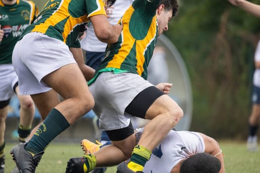 3 may 2025, lisbon. Portugal - oeiras vs ag - intense action during a rugby game as players fiercely compete for possession of the ball