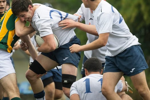 3 may 2025, lisbon. Portugal - oeiras vs ag - rugby players running and competing for the ball during a match