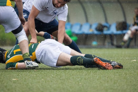 3 may 2025, lisbon. Portugal - oeiras vs ag - rugby players competing for the ball during a rainy match