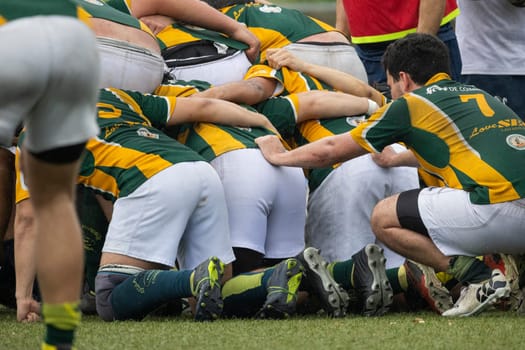 3 may 2025, lisbon. Portugal - oeiras vs ag - rugby players in a scrum formation, competing fiercely during a rugby championship match