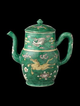 Rare green glazed Chinese porcelain ewer from the early Qing dynasty (1644-83) featuring intricate decorative motifs including a galloping horse, crane, and floral elements.
