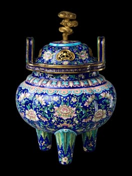 Intricately detailed blue and gold enamel censer from 18th century Qing Dynasty China. Features floral motifs and ornate design, evoking a sense of history and artistic mastery.