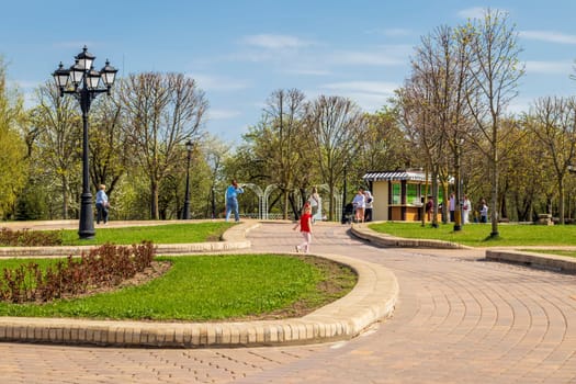 Minsk, Belarus - 05.04.2025 - People enjoying first sunny days outdoors