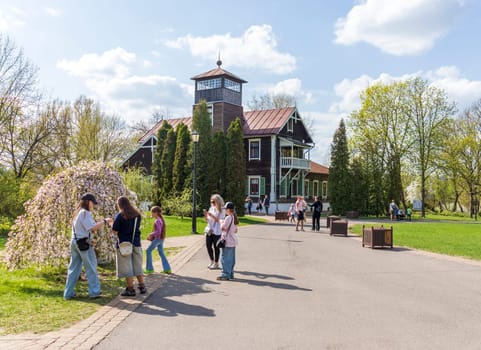 Minsk, Belarus - 05.04.2025 - People enjoying first sunny days outdoors. Museum Loshitsa estate