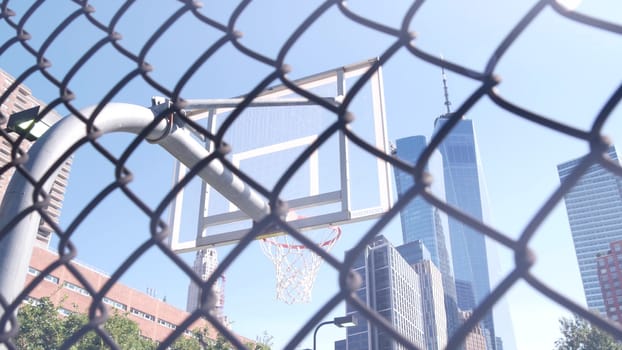 New York City, United States - 31 Aug 2023: World Trade Center, Manhattan Downtown Financial district USA. Hudson River Park basketball court. Basket ball hoop and blackboard. Outdoor streetball sport