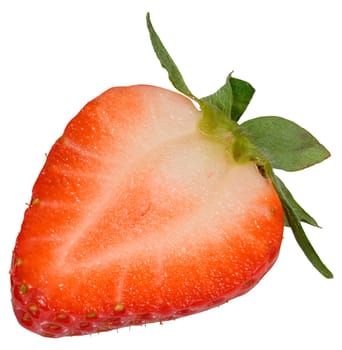 Halved, ripe strawberry with its green leaves still attached, isolated background