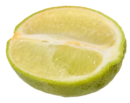 Close-up of a fresh lime wedge with juicy pulp and a bright green peel, isolated background