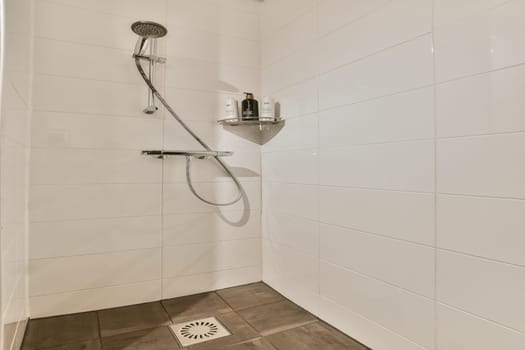 Sleek and contemporary shower setup showcased in a minimalist bathroom, emphasizing clean lines and efficient use of space for a relaxing experience.