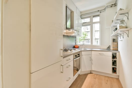 Stylish modern kitchen featuring clean lines, a bright atmosphere, and efficient storage solutions. The design maximizes space while offering functionality.