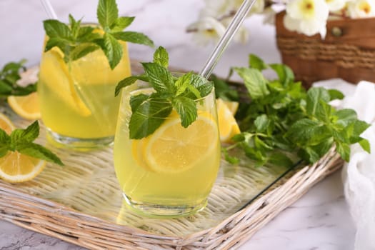 The Limoncello Spritz is a light, refreshing, cool cocktail made with lemon liqueur, prosecco and sparkling water, mint and a slice of lemon.