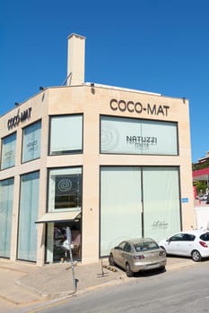 Crete.Greece - may 05, 2025: The image captures the exterior of a COCO-MAT store in Heraklion, Greece, featuring a sleek design, glass windows, and a clean facade under bright daylight.