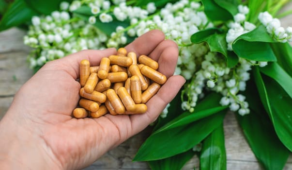 Lily of the valley and flowers supplements. Selective focus. nature.