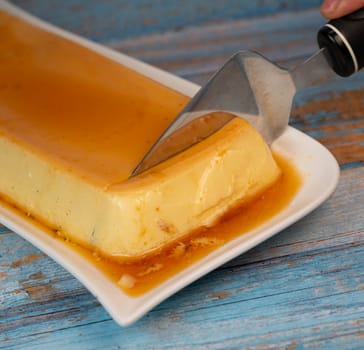Cream caramel pudding with caramel sauce on a plate, Flan, High quality photo