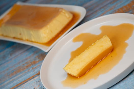 Cream caramel pudding with caramel sauce on a plate, Flan, High quality photo
