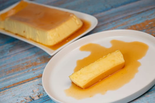 Cream caramel pudding with caramel sauce on a plate, Flan, High quality photo