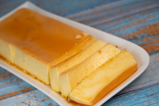Cream caramel pudding with caramel sauce on a plate, Flan, High quality photo