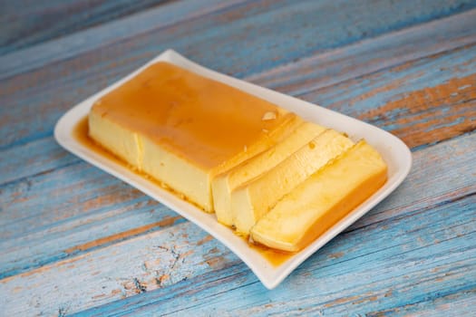 Cream caramel pudding with caramel sauce on a plate, Flan, High quality photo