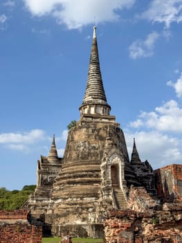 Majestic spiritual Wat Chaiwatthanaram Ayutthaya historic temple, ancient beautiful brick towers glowing under a golden sunset. Spiritual heritage, culture and architectural features.