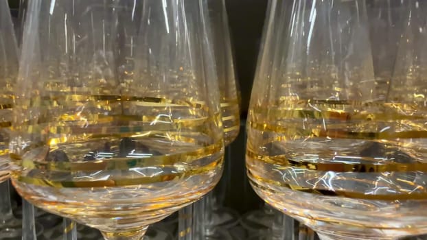 The elegantly crafted glassware with luxurious gold accents is perfect for upscale events and gatherings