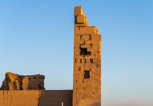 Side view of the temple of Sobek and Horus stands above the River Nile at Kom Ombo