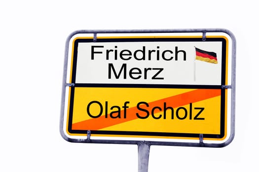 German road sign with Friedrich Merz and crossed-out Olaf Scholz