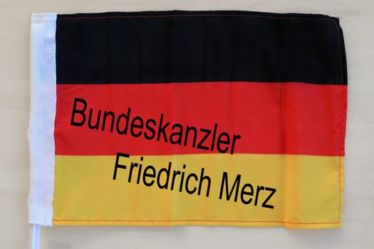 German flag with writing Federal Chancellor Friedrich Merz