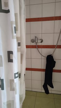 Shower curtain clothes indoor house hotel apartment building architecture interior design objects . High quality photo