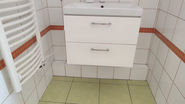 Bathroom sink tiles furniture objects indoor interior design ceramic floor wall room apartment hotel interior . High quality photo green white red