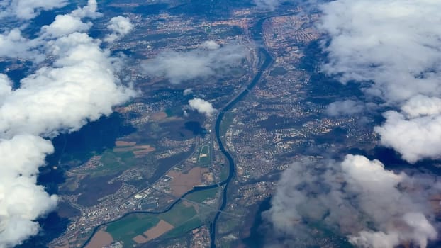 Experience stunning aerial imagery showcasing the beauty of rivers, clouds, and diverse landscapes from above