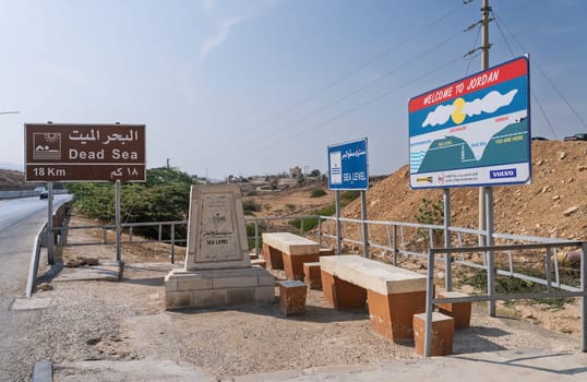 Amman, Jordan - 8 November 2024: Tourist sign showing sea level as you approach the Dead Sea