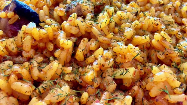 This flavorful rice dish is expertly seasoned with herbs and spices, perfect for any occasion or meal