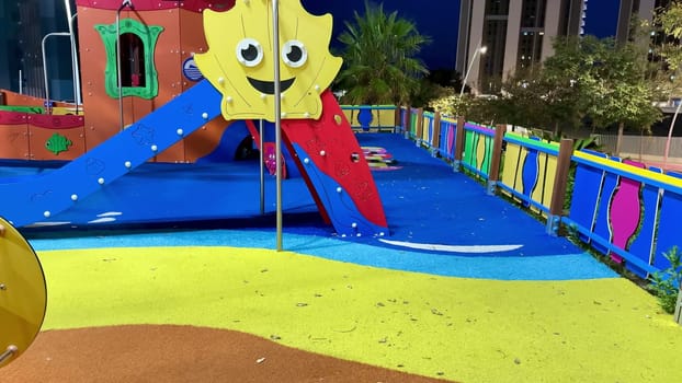 Explore a vibrant playground filled with colorful play structures and safe soft flooring for children.