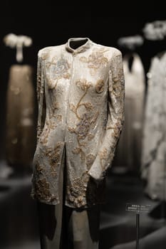 Italy, Milan - 04 December, 2022: Permanent exhibition space with luxury dresses and costumes. Armani Silos, the fashion art space in Milan dedicated to the Armani style.