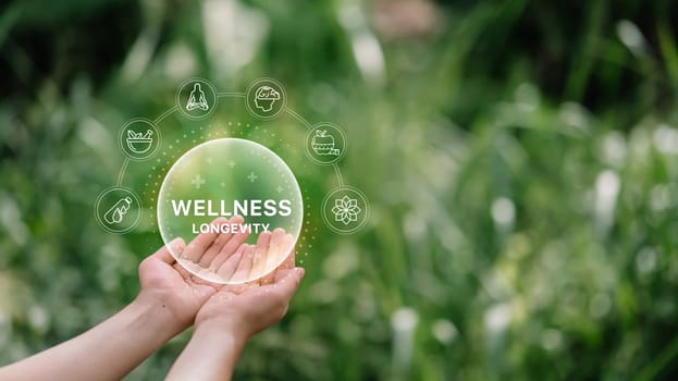 Virtual wellness elements hovering over hands in nature. Holistic health concept.