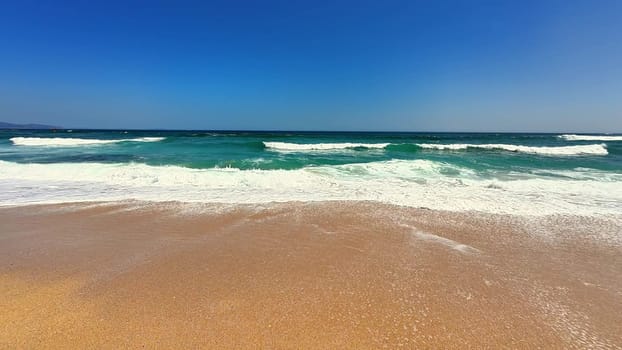 An idyllic beach scene with gentle waves and a clear sky, perfect for relaxation and escaping daily life