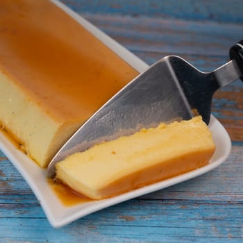 Cream caramel pudding with caramel sauce on a plate, Flan, High quality photo