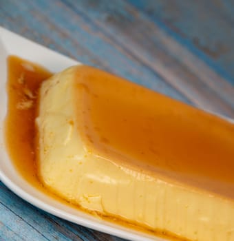 Cream caramel pudding with caramel sauce on a plate, Flan, High quality photo