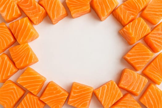 AI generated top view of fresh raw salmon cut into thick premium fillets showcasing vibrant orange-pink color and glistening marbling on clean white background