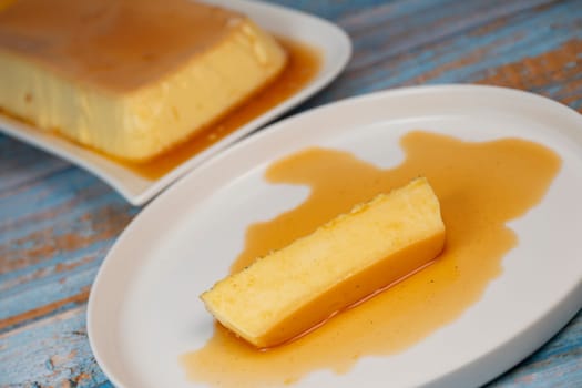 Cream caramel pudding with caramel sauce on a plate, Flan, High quality photo