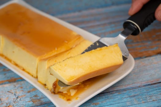 Cream caramel pudding with caramel sauce on a plate, Flan, High quality photo