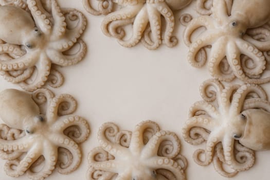 AI generated top view of fresh whole octopus with glistening skin and curled tentacles arranged neatly showcasing premium seafood against clean white background