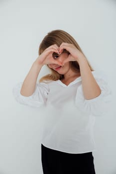 Woman Showing Her Heart With Her Hands Smiling